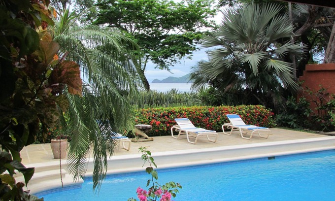 Playa Hermosa House | Casa Luarca. Beach front villa with private pool surrounded by tropical gardens