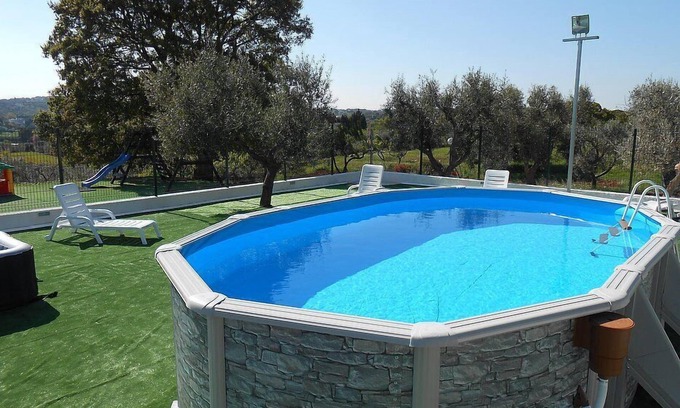Casalini House | Casa Viola C: A welcoming apartment surrounded by the greenery, with Free WI-FI.