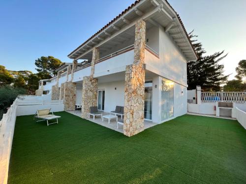 Porto Pino Apartment | Case Vacanze "Bianco Mare"