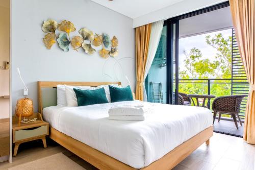 Bang Tao Apartment | Cassia 2 BR Lake&Road View apt by NLA