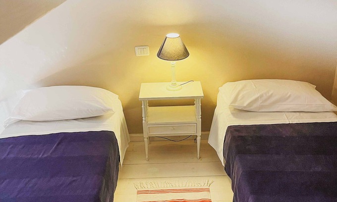 Torre de' Passeri Apartment | "Castle" apartment with one double room and two single beds