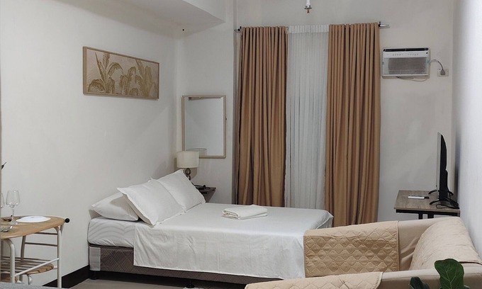 North Reclamation Area Condo | Cebu San Marino Residences- Deluxe Room