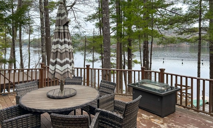 Pine River Pond House | Central lakefront house with private hot tub, dock, patio bar, & beach access