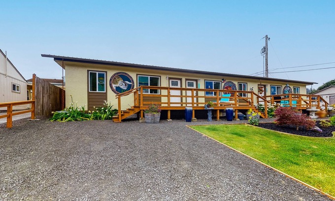 Winchester Bay Condo | Centrally located condo w/ large deck - near the dunes, 1 dog OK!