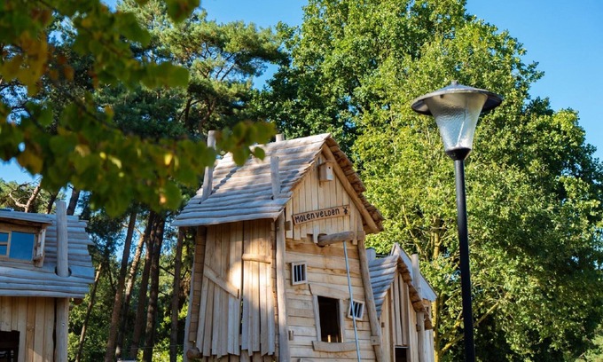 Municipality of Veldhoven Ski Chalet | Chalet by Pond in Eindhoven Holiday Park
