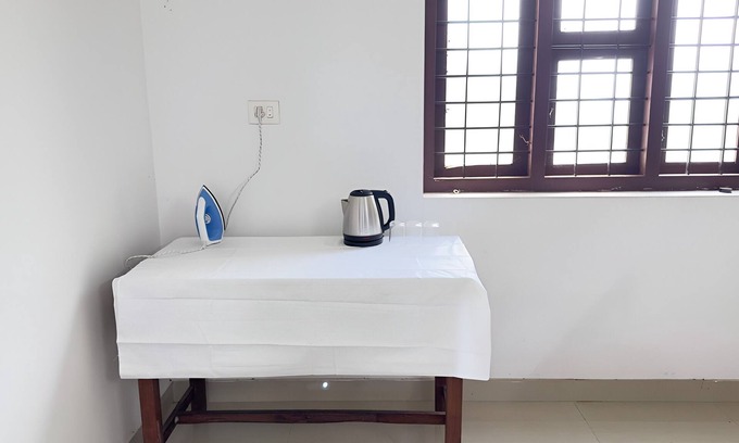 Quilandi House | Charming 1-bedroom house in Koyilandy with WiFi access