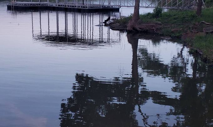 Okmulgee House | Charming 2-bedroom lake house with boat dock in tranquil setting in Okmulgee