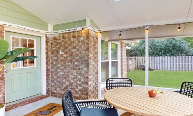 Isle of Hope Historic District House | Charming 3-bed, 2- bath house with open concept living and sunroom in Savannah