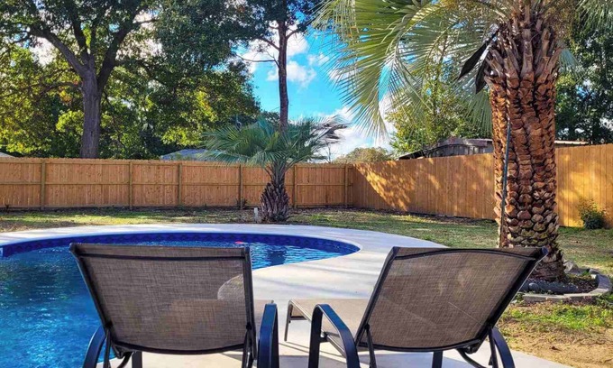 Northwest Pensacola House | Charming 3-bedroom house with Pool, Arcade in serene Pensacola