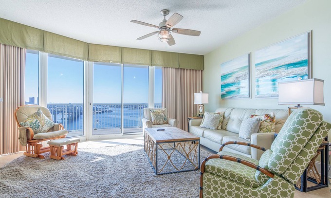 Orange Beach East Condo | Charming Bayside Condo with Magnificent View of Robinson Island! Complimentary Boat Slip!