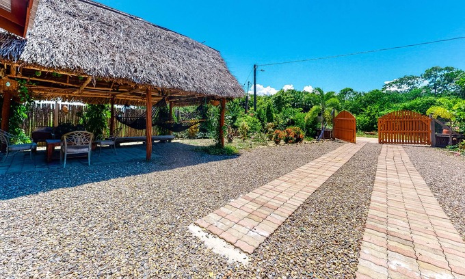 Hopkins Cabin | Charming cabana w/balcony, hammocks, WiFi, AC & shared BBQ - walk to beach clubs