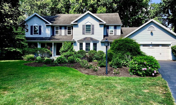 Perinton House | Charming, comfortable and spacious Pittsford home on a pond.