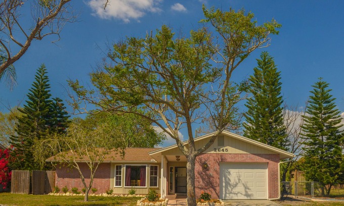 Ringling Park House | Charming Florida bungalow with pool and fenced-in yard.