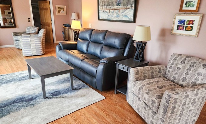 Norway House | Charming lakefront home with water views, dock & inviting deck, Central A/C