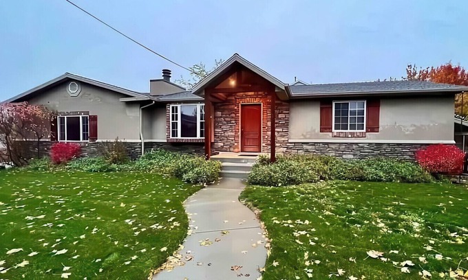Millcreek House | Charming Mountain Retreat with Enclosed Backyard and Artistic Flair