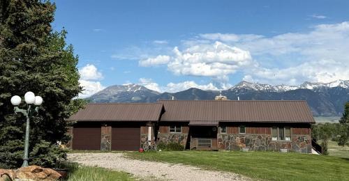 Ennis House | Charming Riverfront Guest House with Deck Overlooking Madison River, Near Ennis, Montana