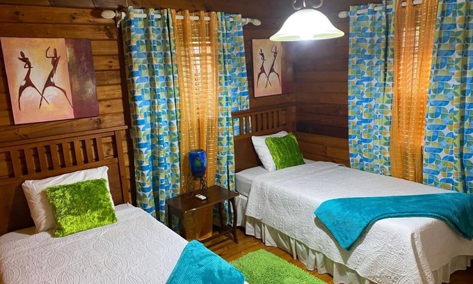 Signal Hill Cabin | Charming SEAVIEW lodge TUCKED IN THE MOUNTAINSIDE of Signal Hill TOBAGO