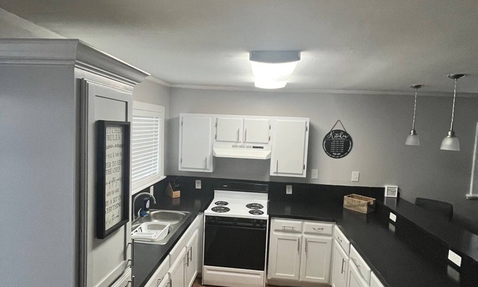 Rio Hondo House | Charming, spacious, 2-bedroom house with WiFi, AC in enjoyable Rio Hondo.
