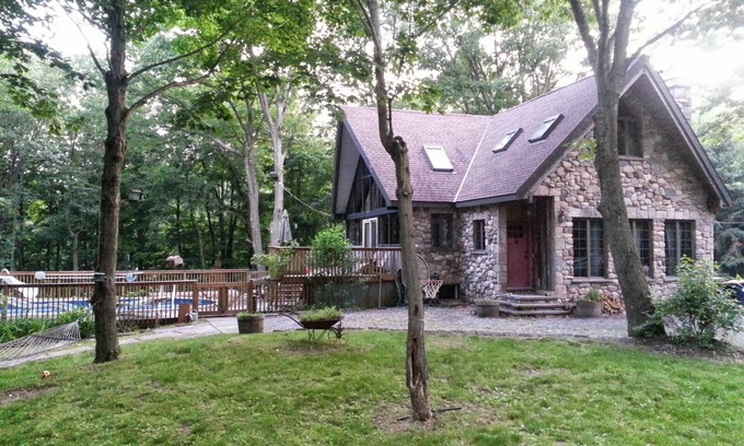 Clinton Corners House | Charming Stone Chalet in Wooded Surroundings with Heated Pool Spring to Fall.