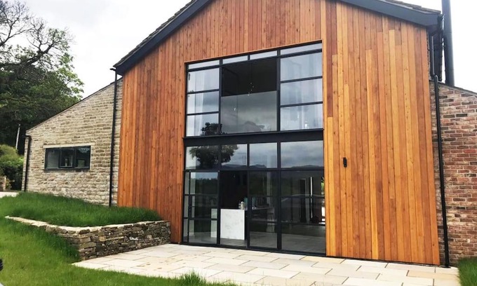 Sutton House | Cheshire Barn. views, bbq, fire pit, TV, Wifi