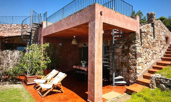 Chia Apartment | Chia, Sardinia Large Apartment 200 meters from the sea with Terrace and Garden