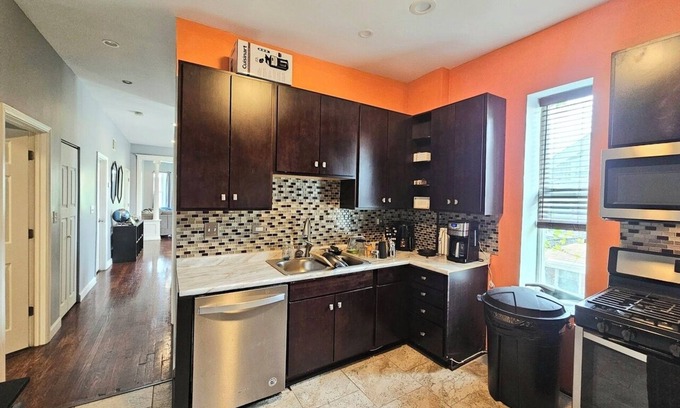 South Shore Apartment | Chic 3-bedroom corporate apartment with WiFi, AC in lovely Chicago.