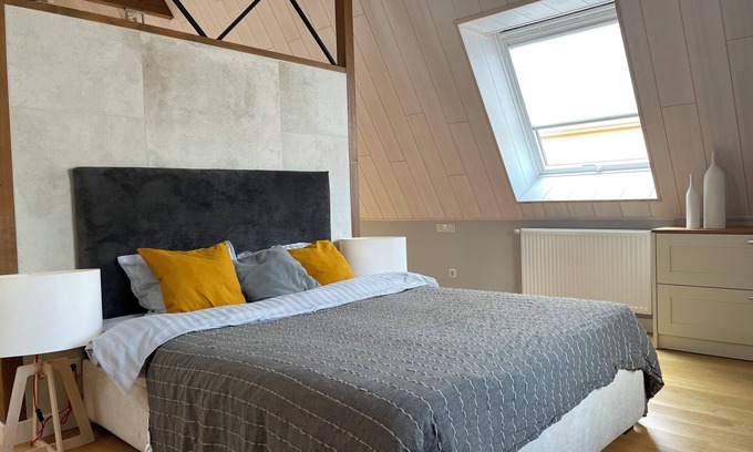 Pohja-Tallinn Apartment | Chic Old Town Apartment with Soaring Ceilings and Modern Comforts
