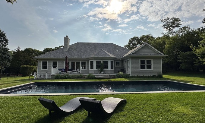 Hampton Bays House | Chic Retreat, Walk to Beach, Solar-Heated Pool, EV Charger, Large 4 Bedrooms,