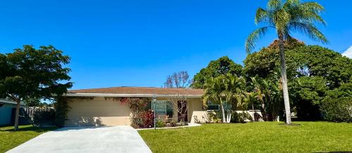 Southgate House | Classic Tropical Florida Escape with Heated Pool