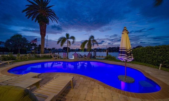 Indian Rocks Beach House | Coastal Elegance: Retreat with Heated Pool, Golf Cart, and Entertainment Haven