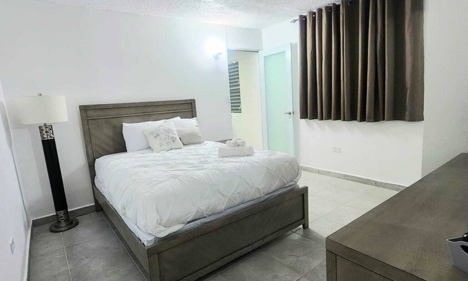 Levittown Apartment | Coastal Getaway: Steps from Shops, Dining & A Mile to the Sands