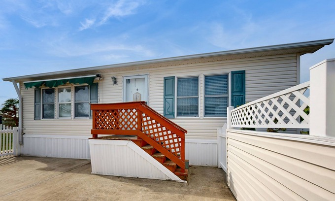 Assateague Pointe House | Coastal living with on-site pool, playground, grills, central AC, & washer/dryer