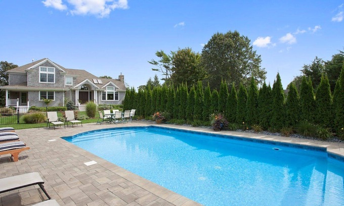 Westhampton House | Coastal traditional canal-front home with water views from most rooms....