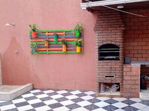 Vila Julia Apartment | Cobertura com Churrasqueira própria e Wi-Fi perto da Praia - Excelente para Família e Amigos