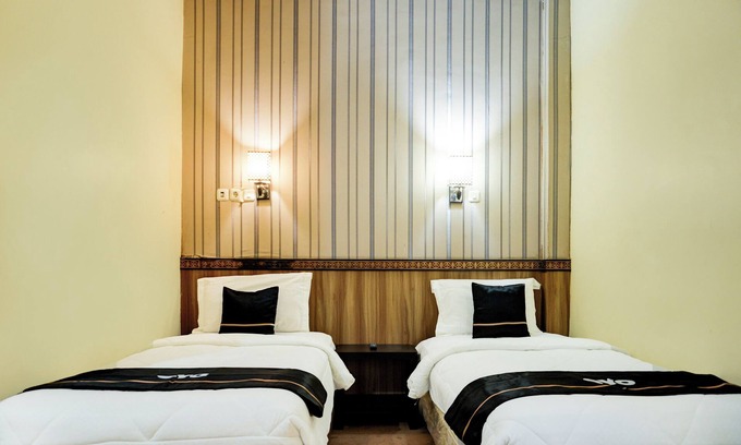 Palembang Hotel | Collection O R.Sukamto Near Palembang Trade Center Mall