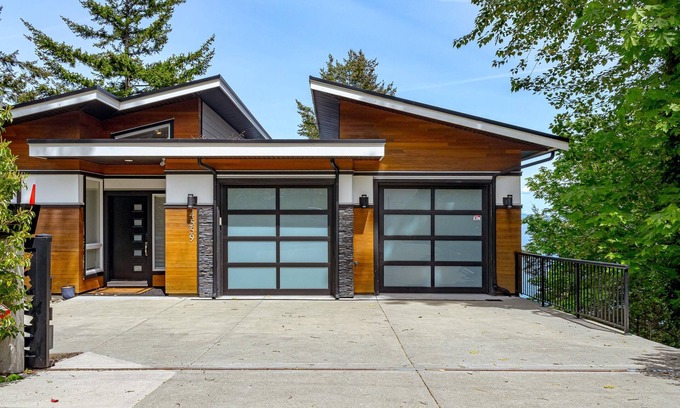Cordova Bay House | Come on in, the water view is waiting for you.
