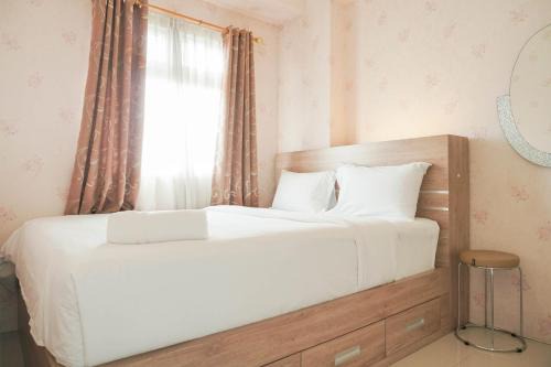 Rawasari Apartment | Comfort 2BR Green Pramuka City Apartment near Shopping Center By Travelio
