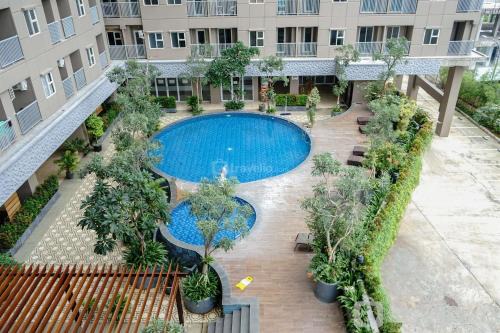 Ciputat Apartment | Comfort and Cozy Stay Studio Room at Baileys Apartment By Travelio