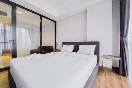 Pinang Apartment | Comfort Living and Homey 1BR The Smith Alam Sutera Apartment By Travelio