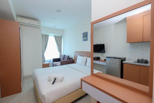 Pekayon Jaya Apartment | Comfort Living Studio at Grand Kamala Lagoon Apartment By Travelio