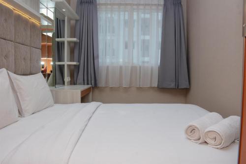 East Jakarta Apartment | Comfortable 1BR at Signature Park Grande near Cawang Station Apartment By Travelio