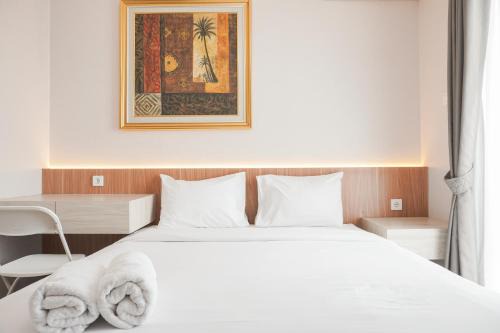 East Jakarta Apartment | Comfortable and Minimalist Studio Apartment at Woodland Park Residence By Travelio