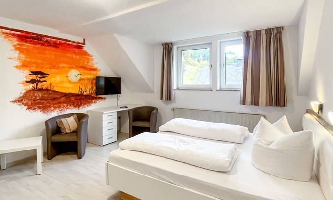 Winterberg House | Comfortable and versatile room -perfect for relaxation, work and exchange