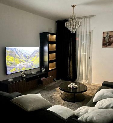 Al Nahda Apartment | Comfortable Apartment Bedroom And Spacious Living Room Family and Couple