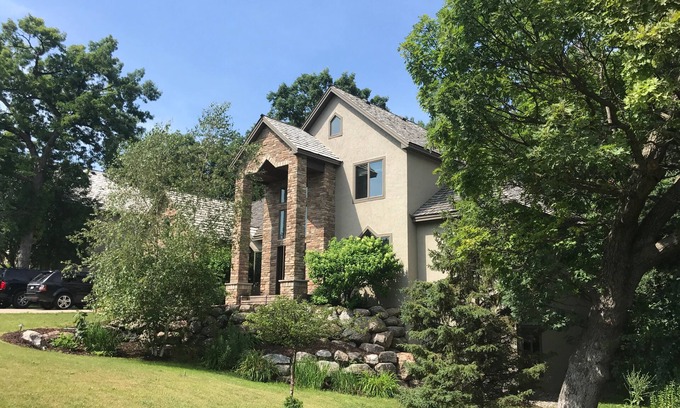 Eden Prairie House | Comfortable Home with Sauna, Hot Tub, Pool Table, Bar, Outdoor Fire Pit!