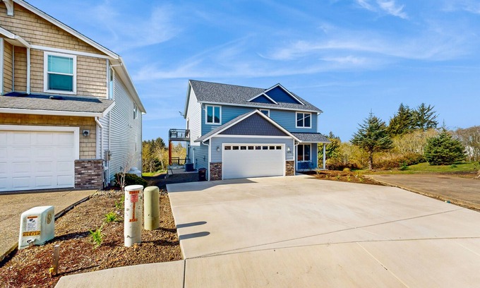 Netarts House | Comfortable home with ocean views, with private hot tub, deck, fireplace, WiFi