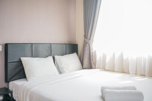 Serpong Apartment | Comfortable Parkland Avenue 2BR Apartment By Travelio