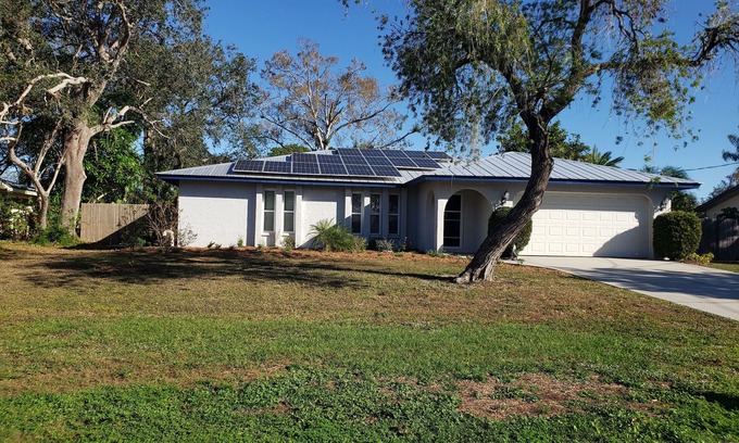 Sarasota Springs House | Comfortable updated 3 bedroom home - enclosed, solar heated pool, private yard.