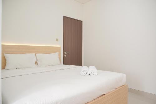 Depok Apartment | Comfy and Homey 2BR Transpark Cibubur Apartment By Travelio