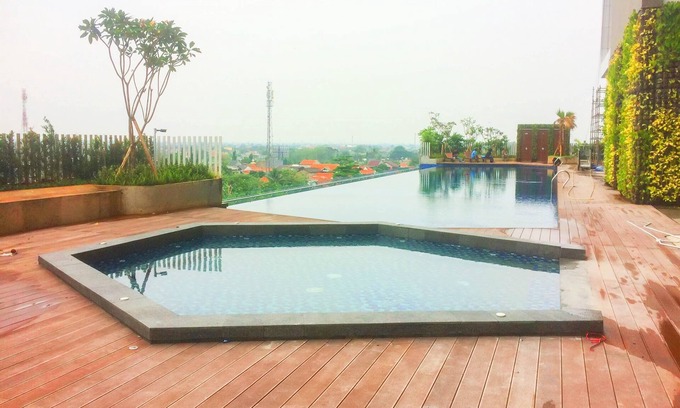 Panunggangan Utara Apartment | Comfy and Tranquil Studio Apartment Springwood Residence